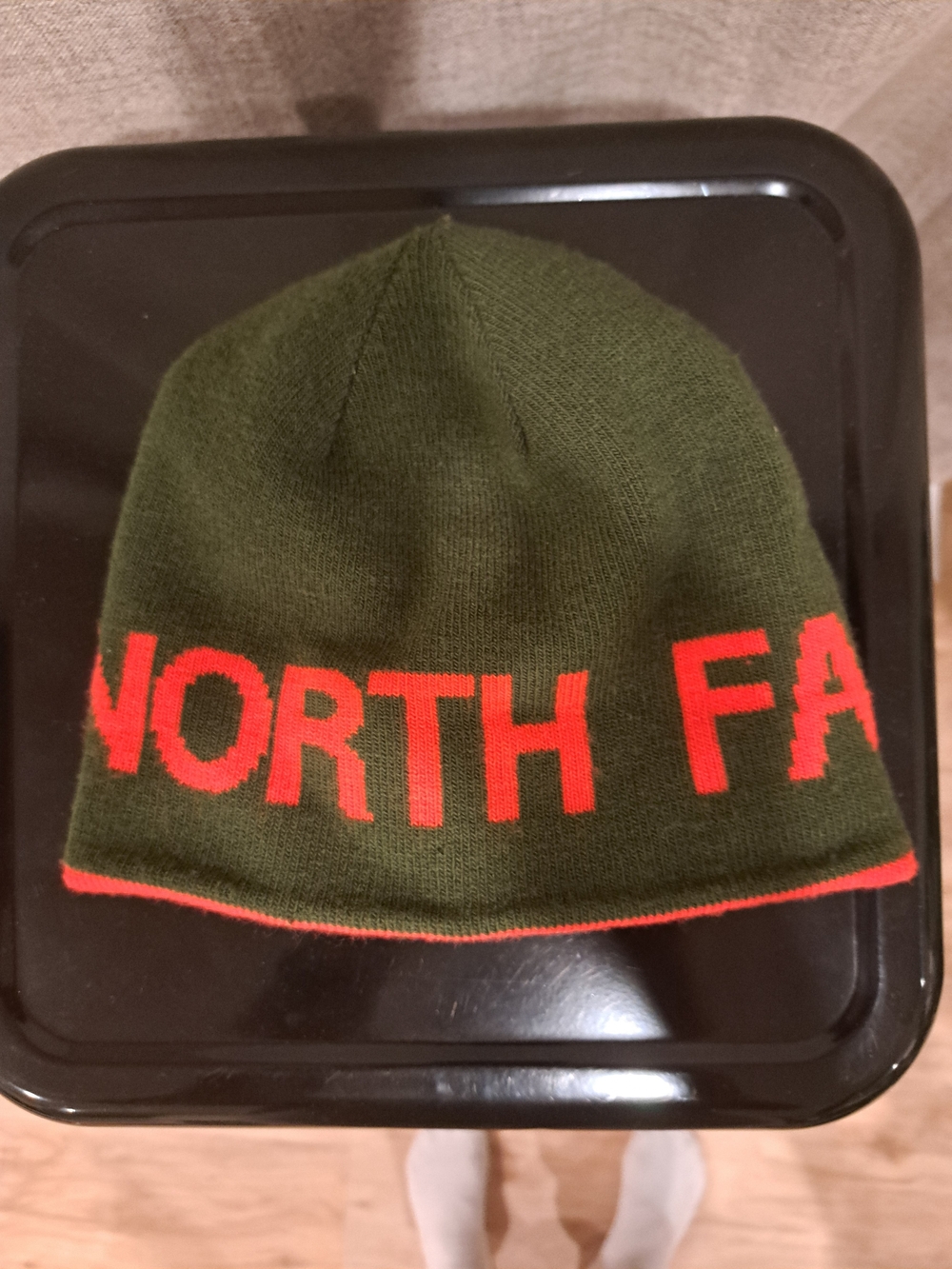 The North Face Reversable Olive Knit Beanie with Orange Logo Trim
